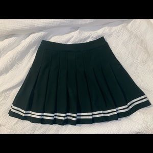 Green cheerleader style pleated skirt